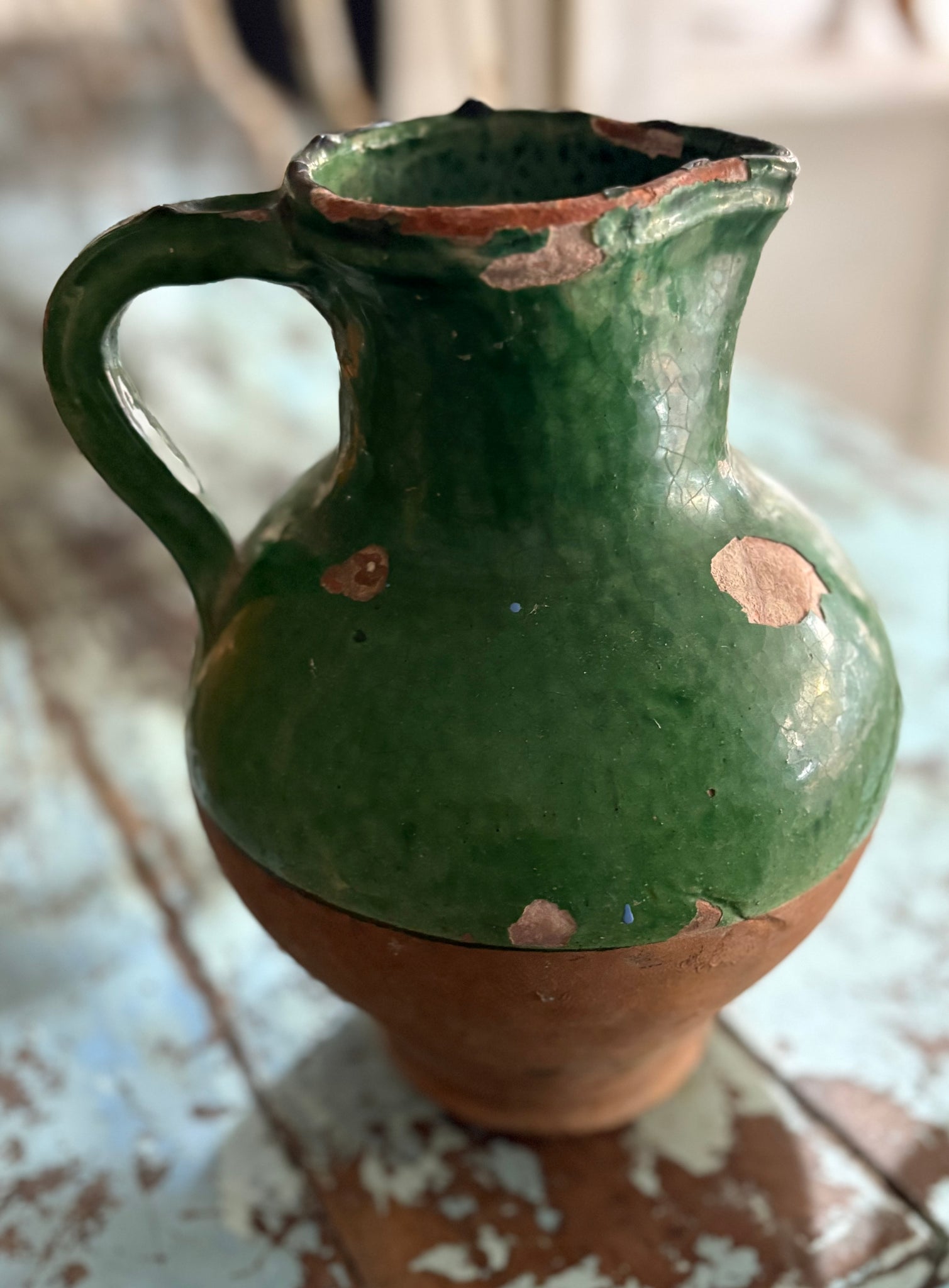 Antique green glaze jug