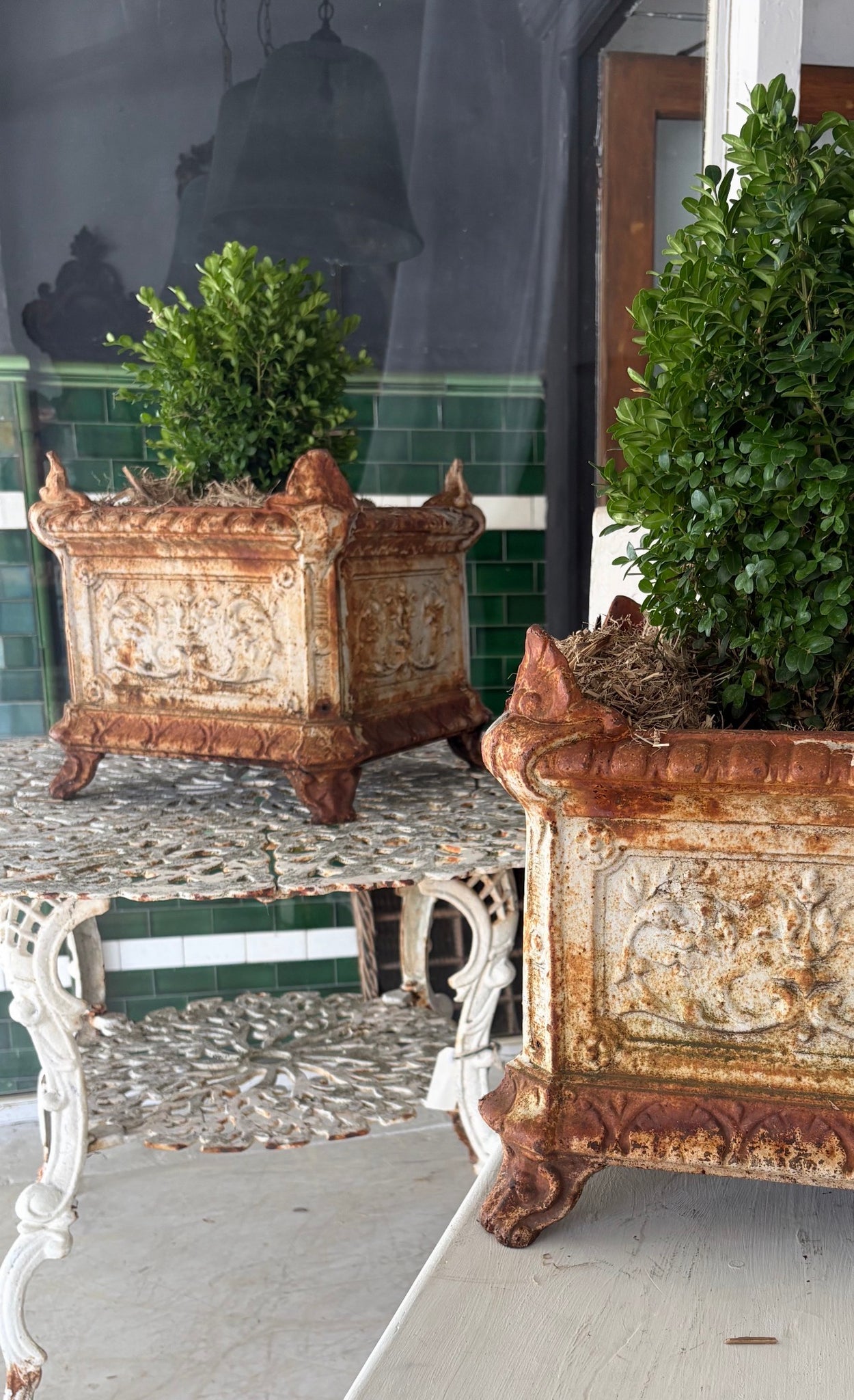 Pair of cast iron urns