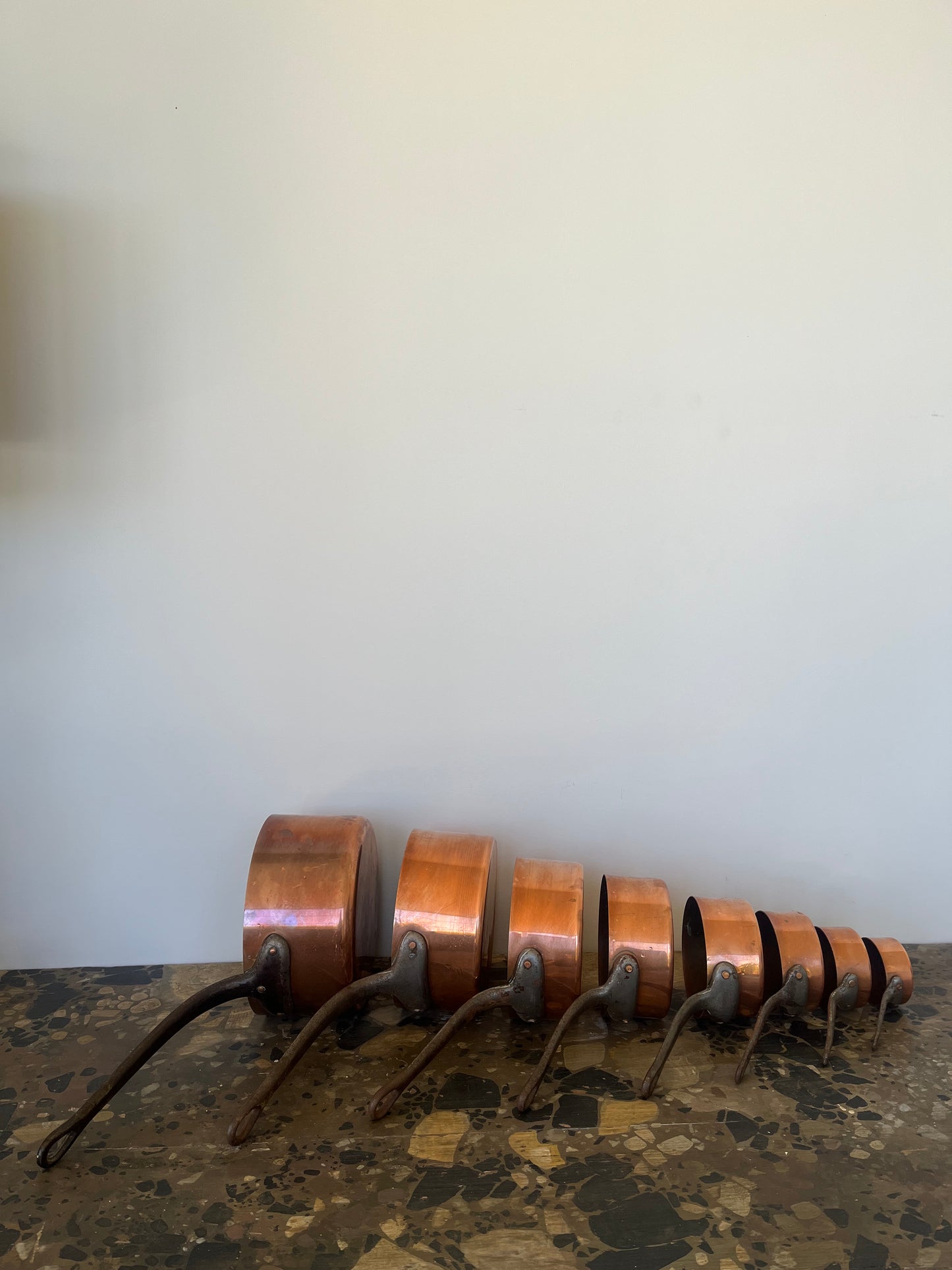 Set of 8 French copper pots