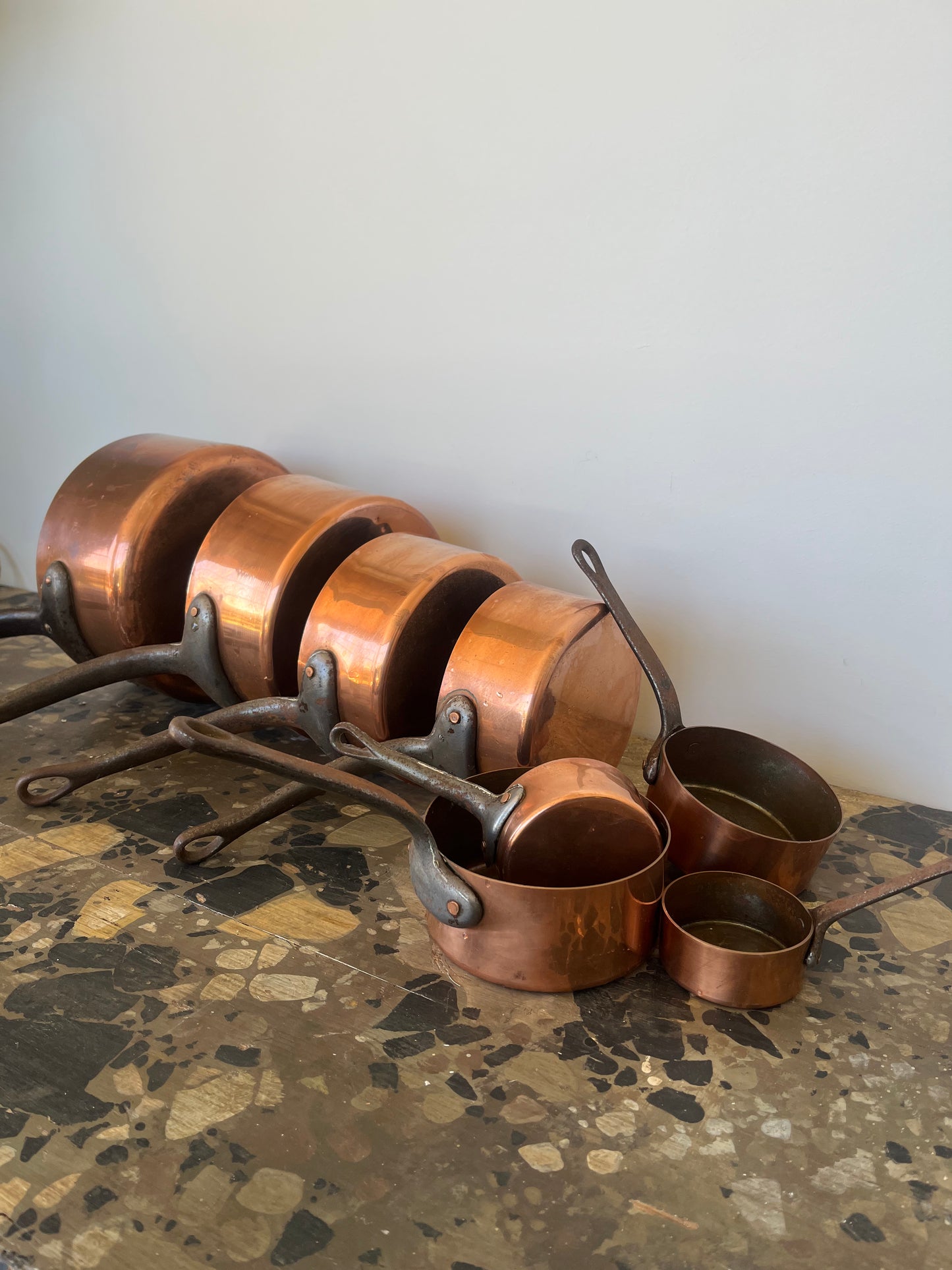 Set of 8 French copper pots