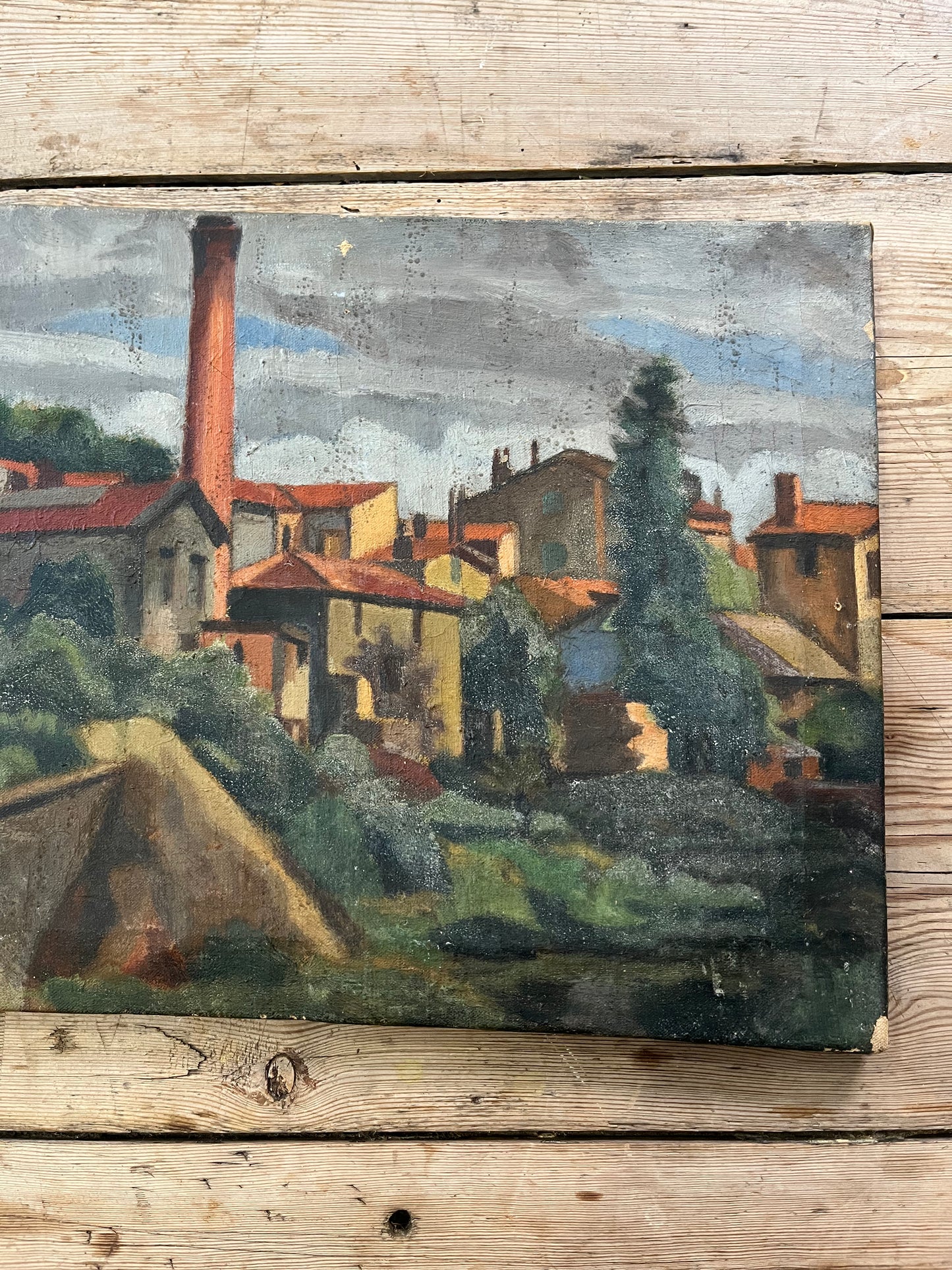 Antique painting of landscape with buildings