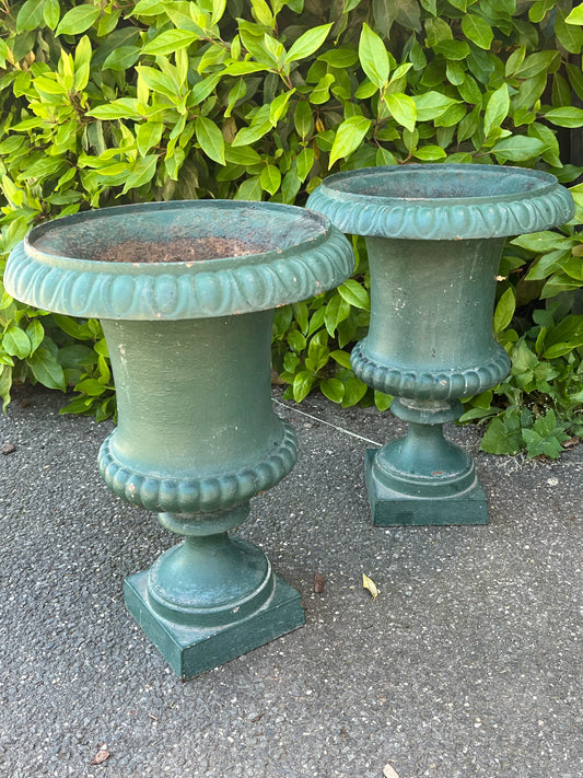 A pair of Antique cast iron urn